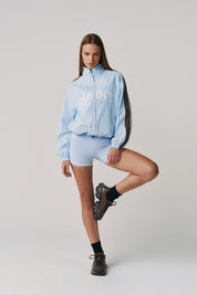 THE GROUNDS TRACK JACKET - BABY BLUE