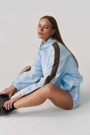 THE GROUNDS TRACK JACKET - BABY BLUE
